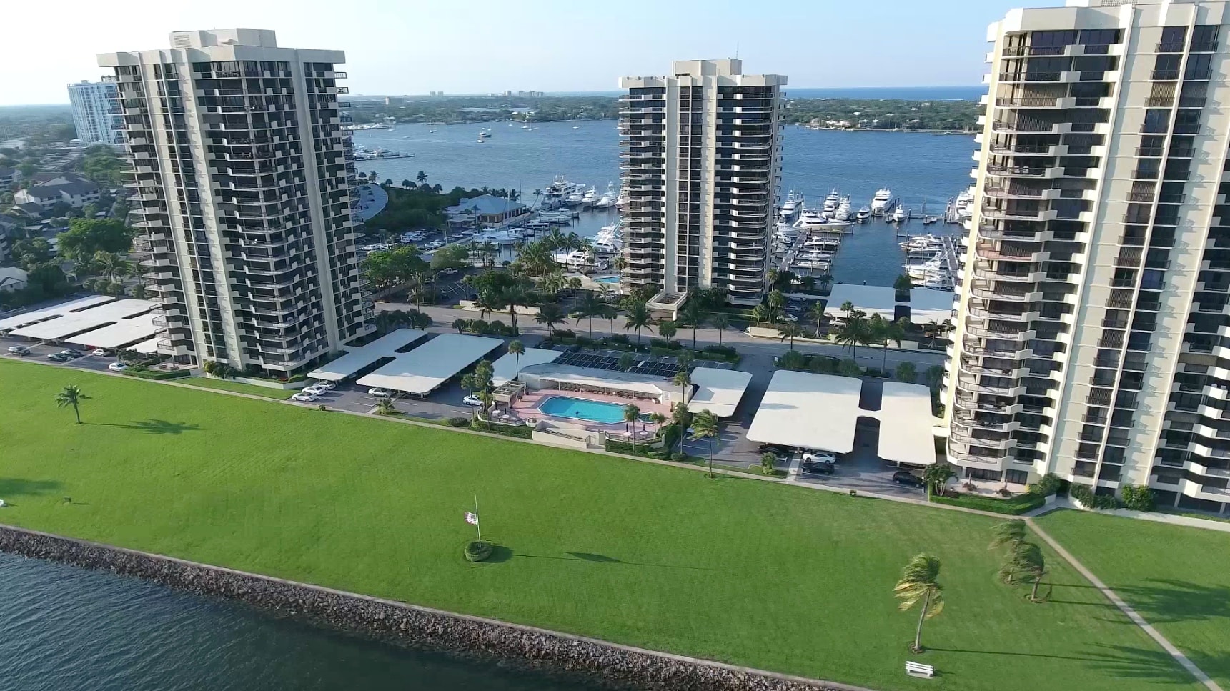Aerial view of luxury waterfront condominiums with marina, Palm Beach County